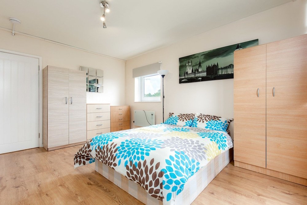 Фото Queensland House Deluxe Guest Room