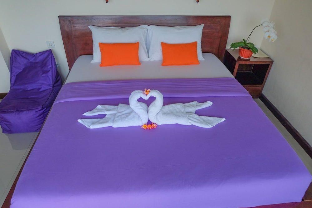 Фото Putra Homestay