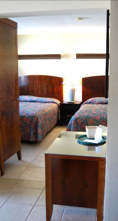 Фото Bedtime Inn & Suites