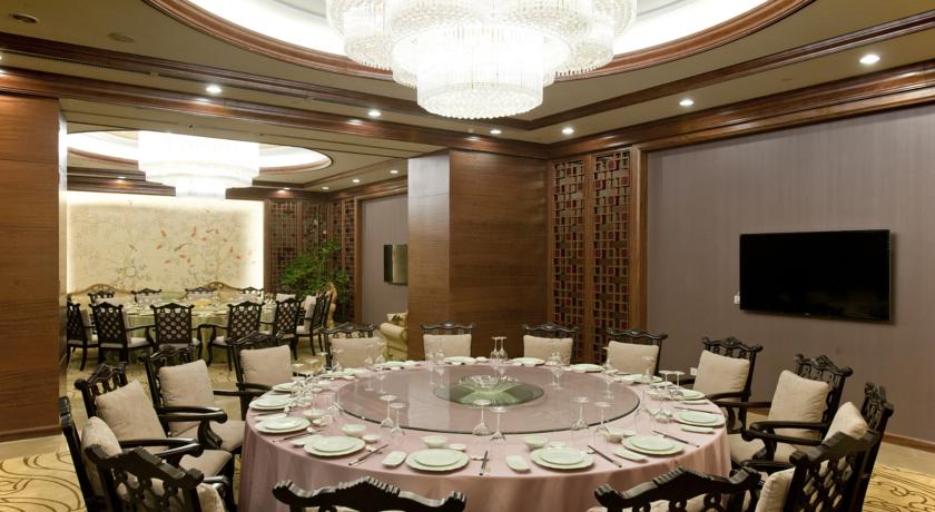 Фото China National Convention Center Grand Hotel