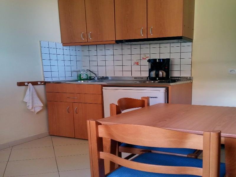 Фото Dionysos Apartments