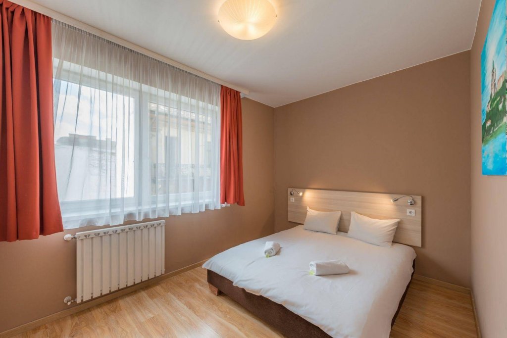 Фото Corvin Plaza Apartments and Suites