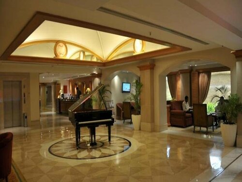 Гостиница Ramada Plaza by Wyndham Palm Grove в Мумбаи
