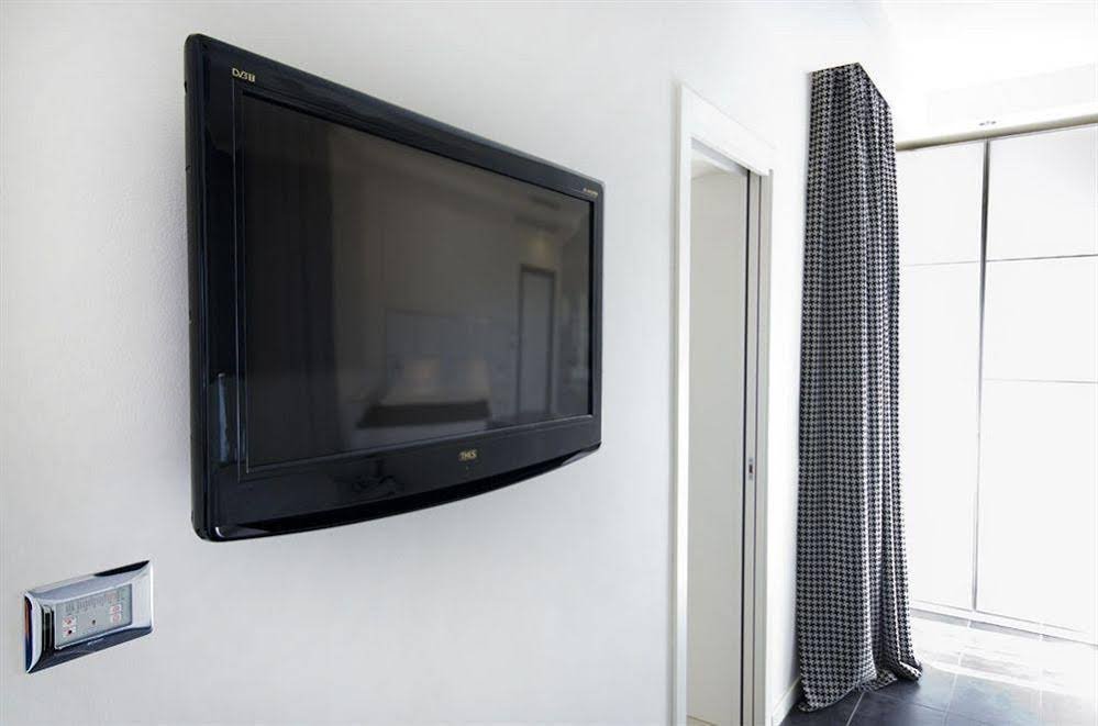 Фото Atmosphere Suite Hotel