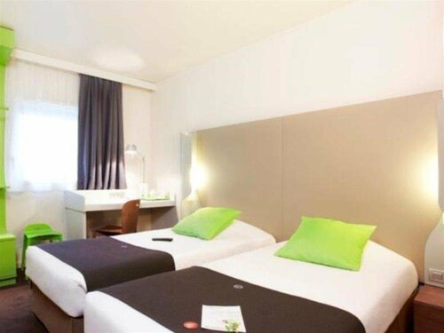 Гостиница Hotel Campanile Roissy-En-France в Ле-Ренси