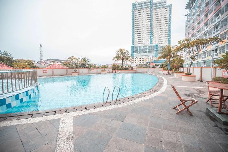 Фото Oyo 266 Margonda Residence 5