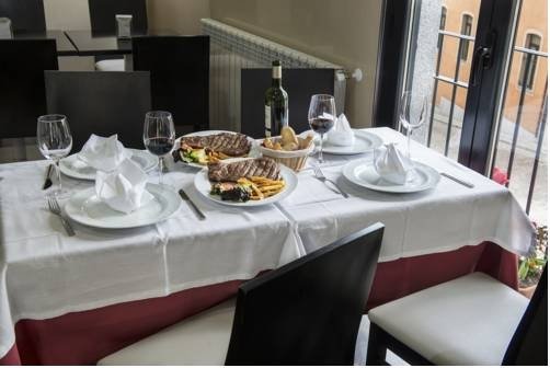 Фото Hotel Puerta de la Santa