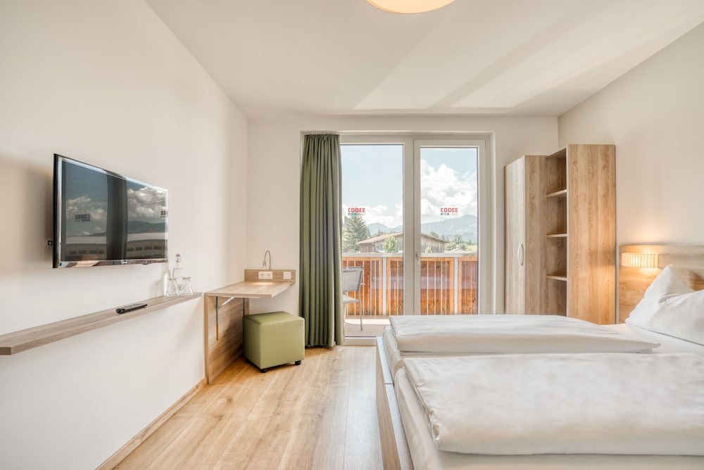 Фото Cooee alpin Hotel Kitzbüheler Alpen