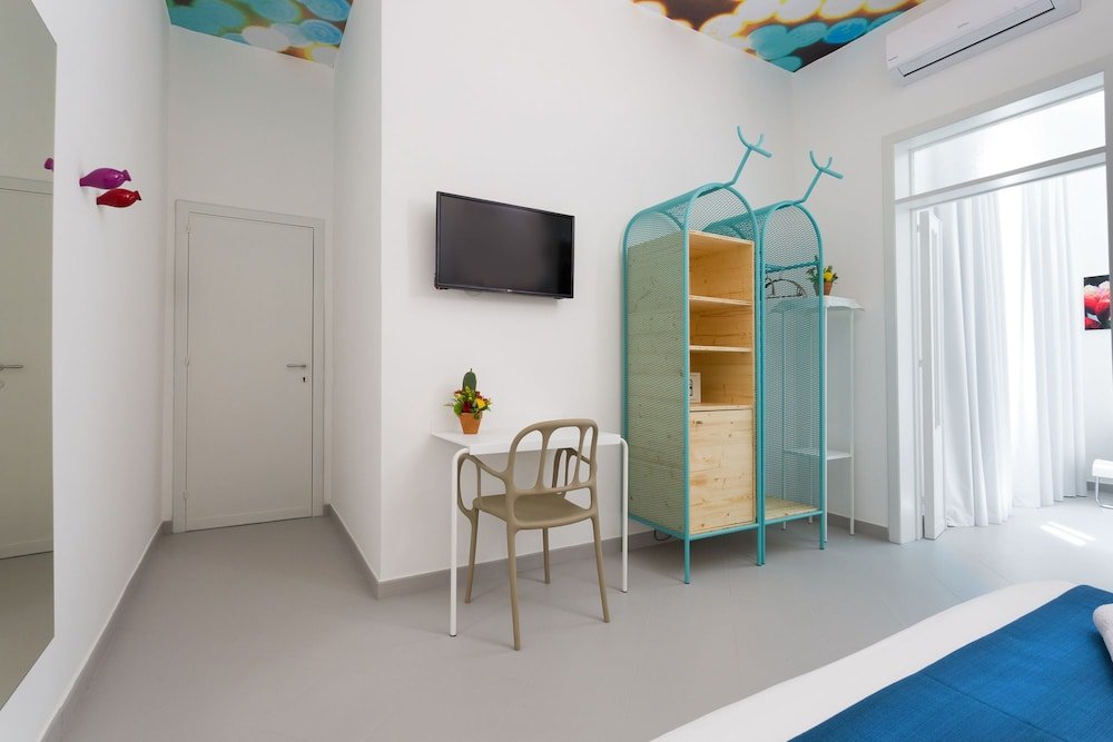 Фото Hotel L'Uomo e il Mare