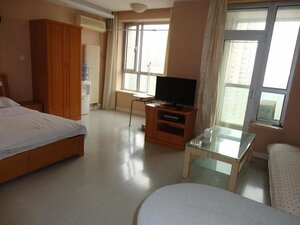 Апартаменты Dalian Xiu Zhu Mansion Apartment