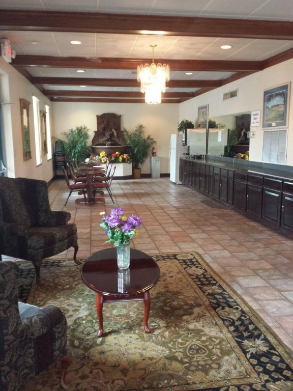 Фото Garden Inn & Suites