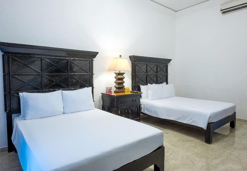 Фото Hacienda Paradise Hotel by Hospitality Wellbeing