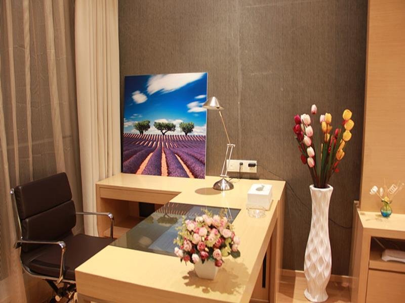 Фото Guangzhou Xing Yi International Apartment - Poly World Branch