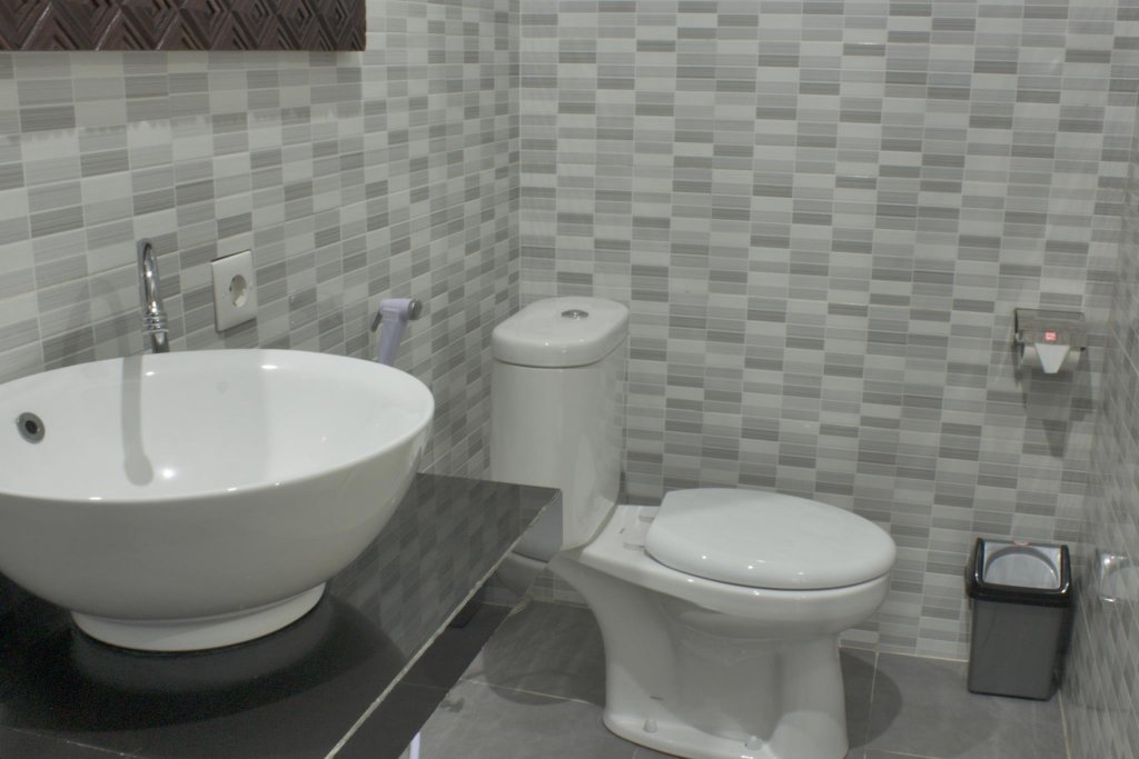 Фото Putra Homestay