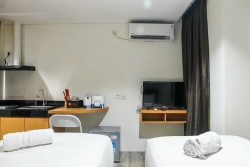 Гостиница Comfy Studio Room Bintaro Icon Apartment