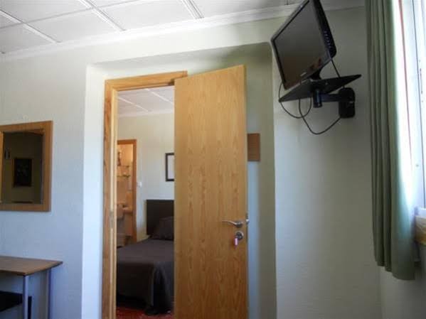 Фото Hostal El Callejon