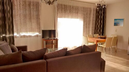 Гостиница Tholos Bay Suites