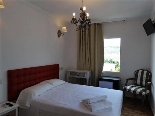 Фото Hotel Casa Día y Noche