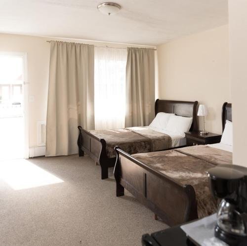 Фото Moon Inn Hotel