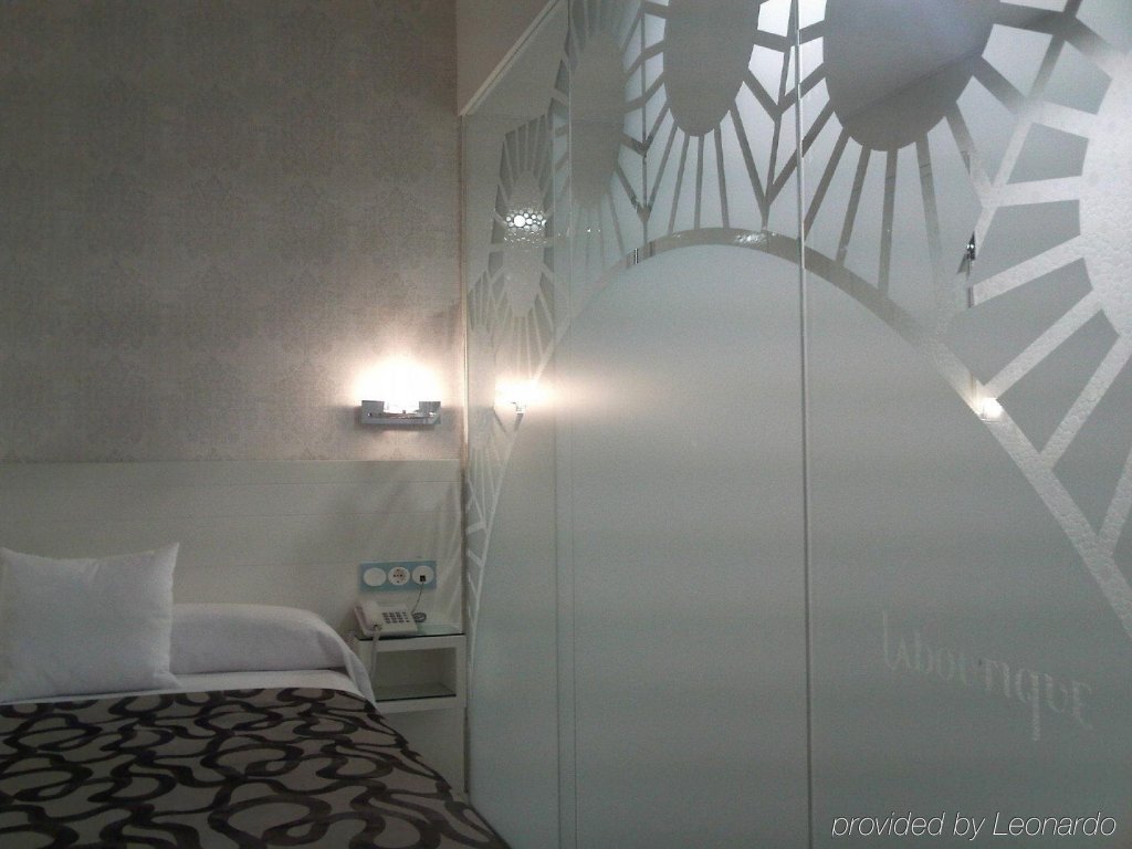 Фото Hotel La Boutique Puerta Osario