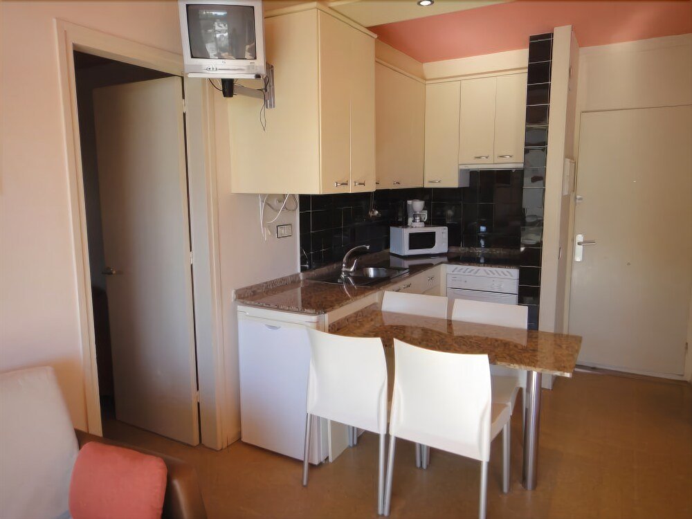Фото Aparthotel Comtat Sant Jordi