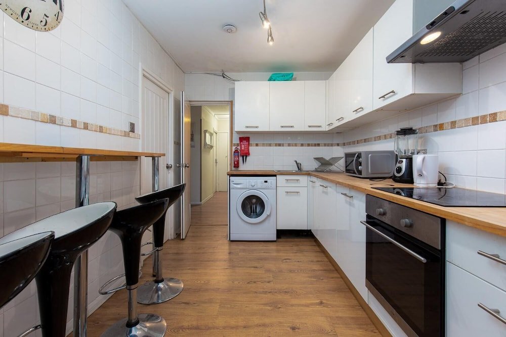 Фото Queensland House Deluxe Guest Room