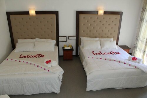 Гостевой дом Thoddoo Inn на Тодду
