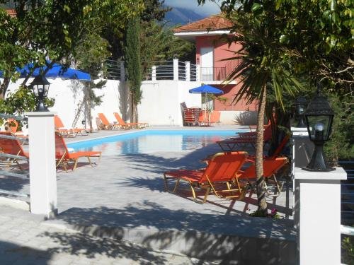 Фото Odyseas Studios - Near Lourdas Beach