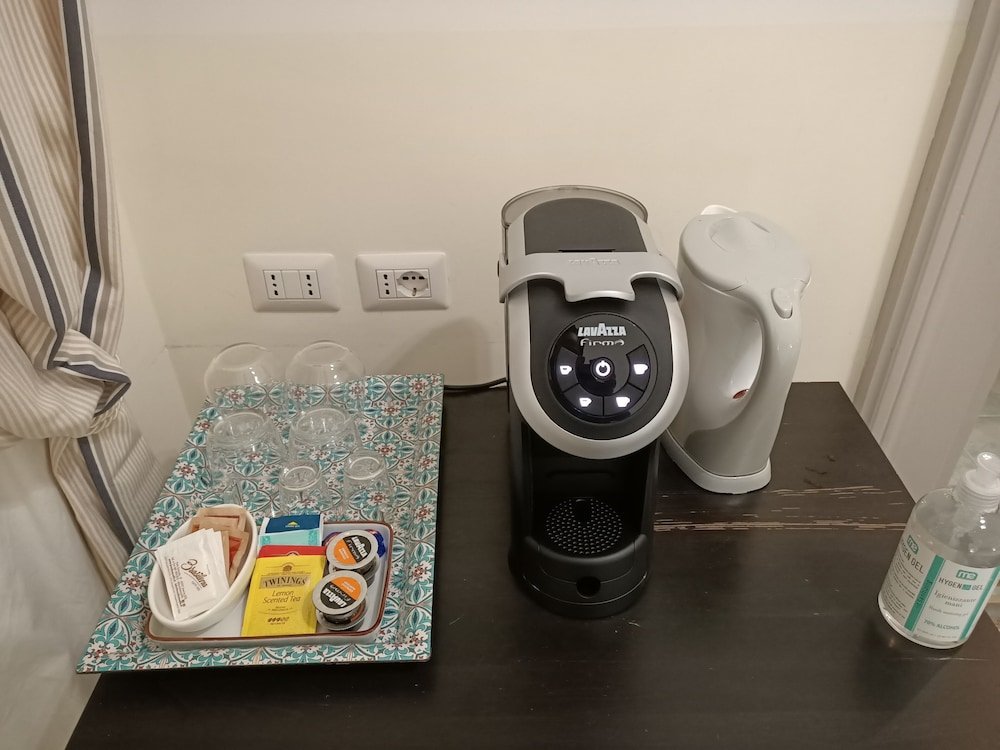 Фото Biancoreroma B&b