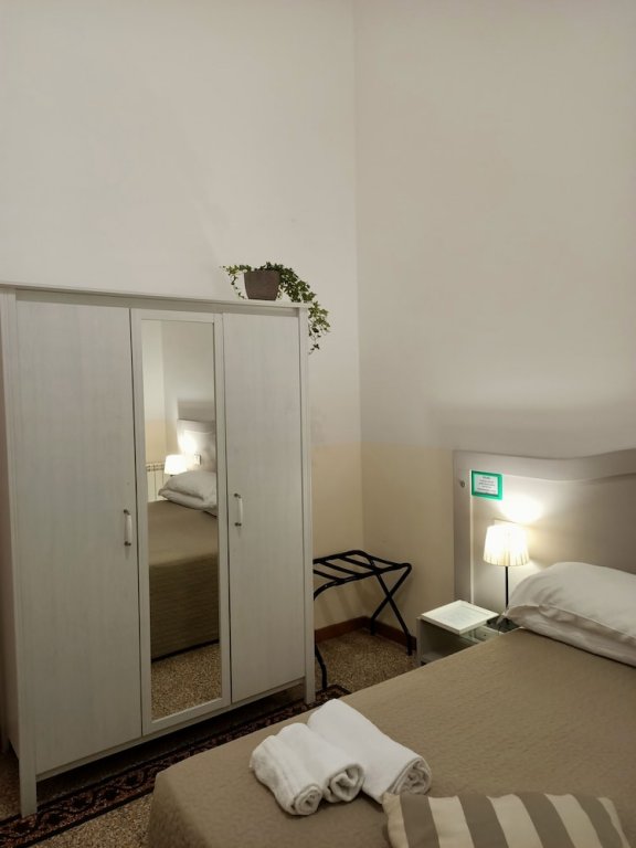 Фото Biancoreroma B&b