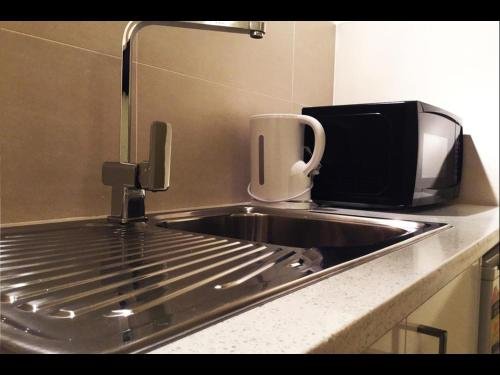 Фото Grand Central Serviced Apartments