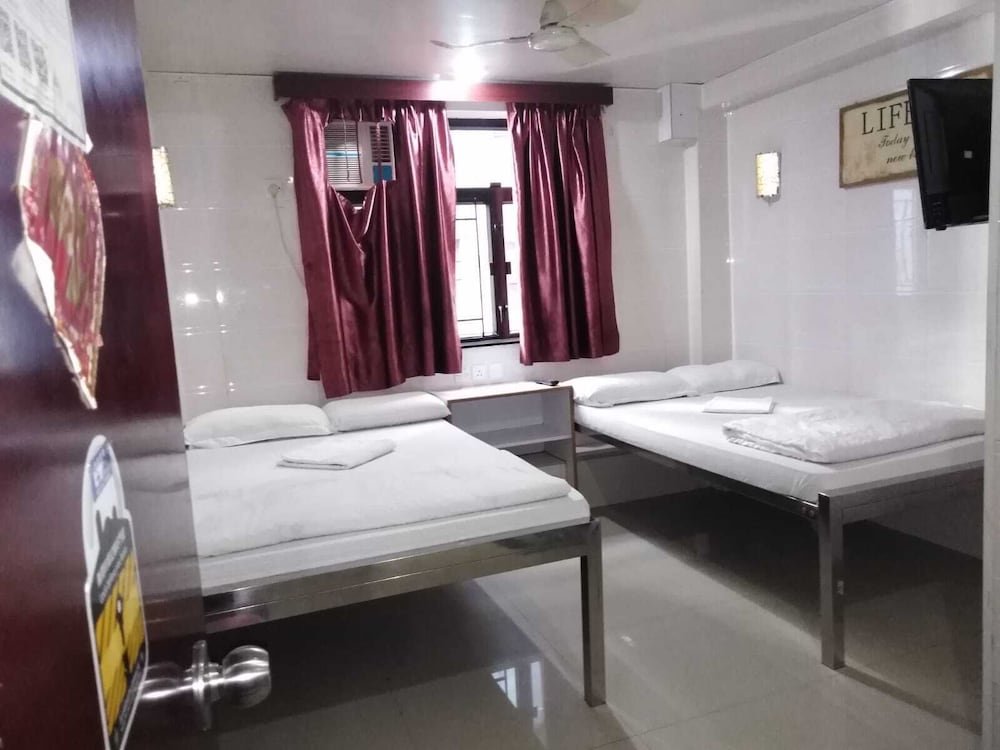 Фото Kowloon Tst Guest House