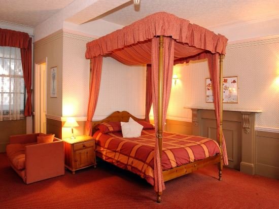 Фото The New Inn by Roomsbooked