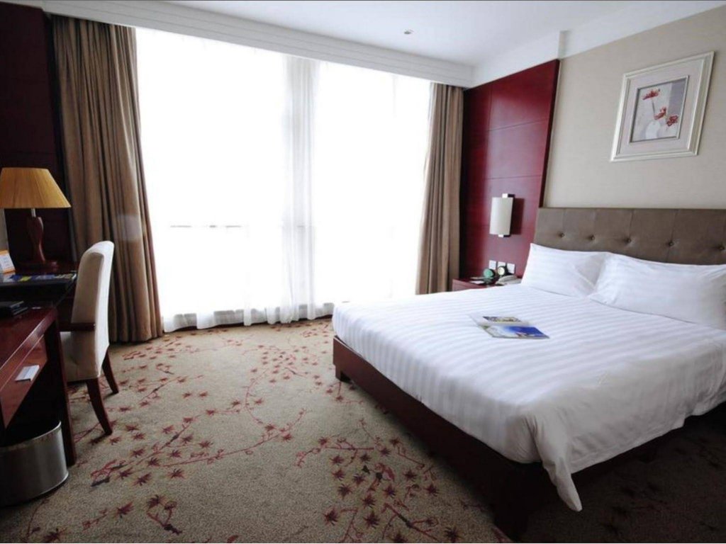 Фото Tianjin Huigao Garden Hotel