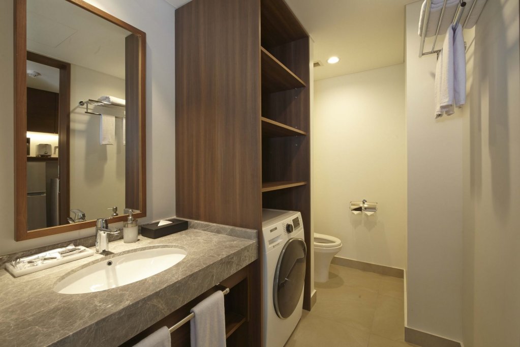 Фото Axia South Cikarang Service Apartment