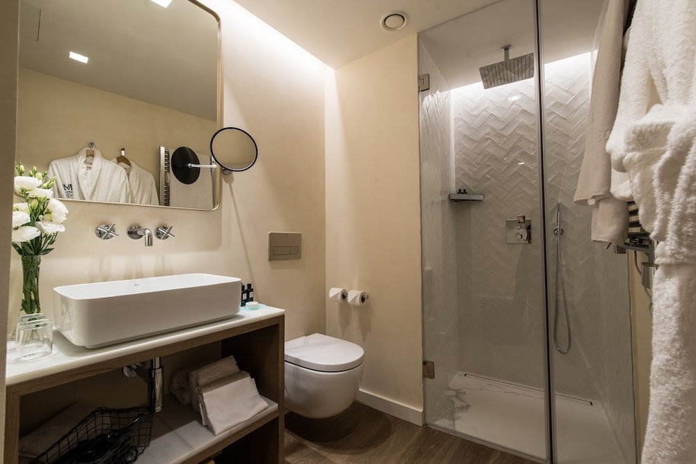 Фото Suites Murillo Plaza Sta Cruz