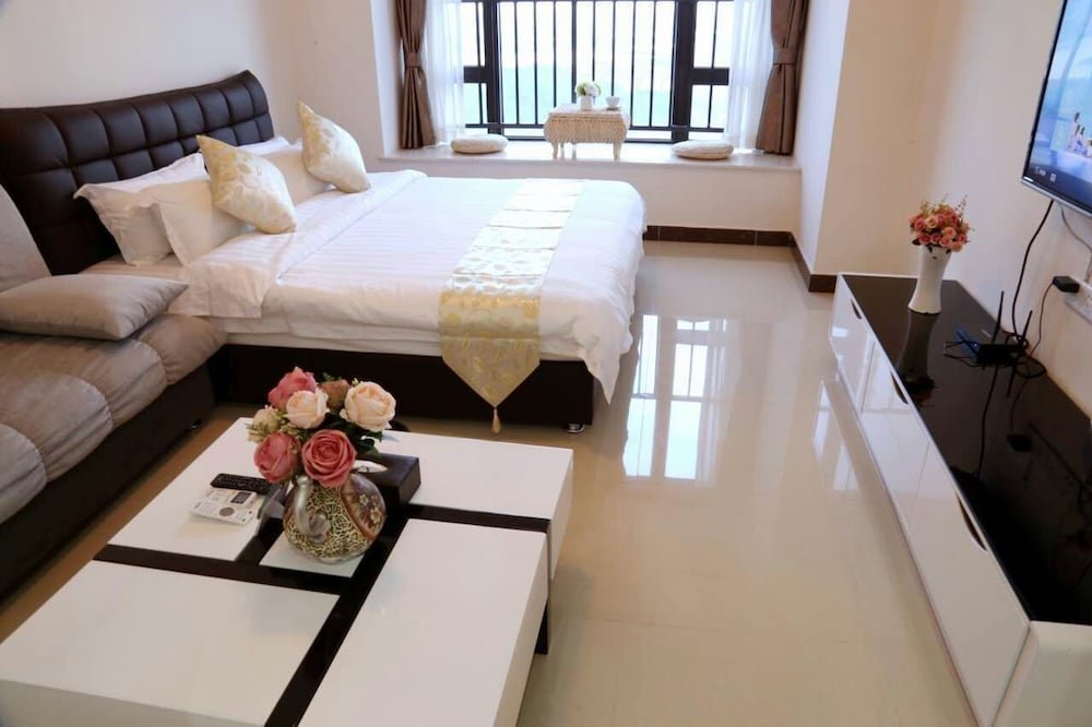 Фото Guangzhou Yi Long International Apartment