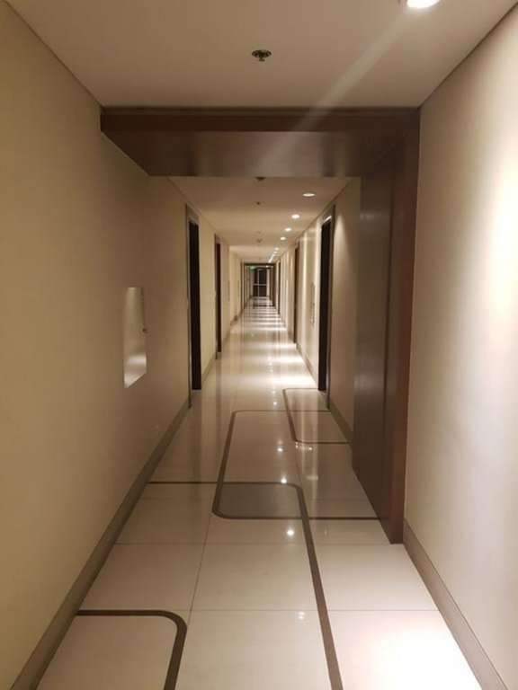 Фото Tess and Tessha Condotel near T3 Airport