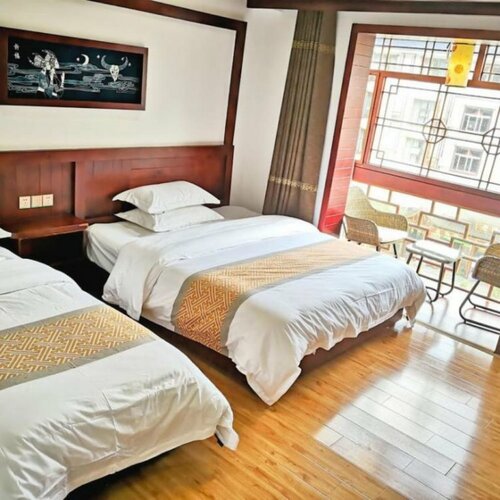 Гостиница ZhangJiaJie GuoKe Inn