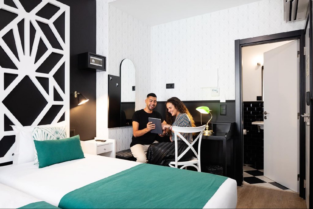 Фото The Twenties Rooms & Suites