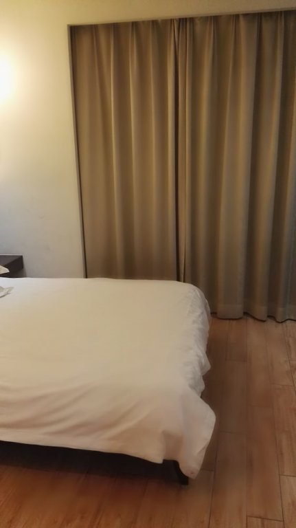 Фото Shanghai Jiarong Hotel Apartment