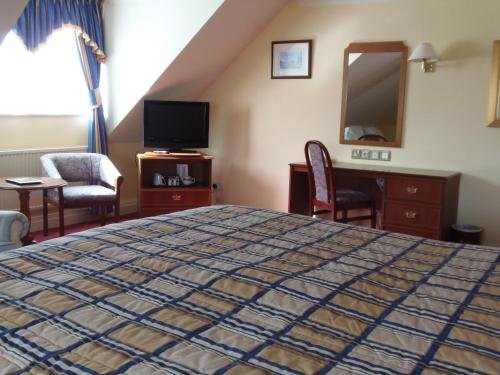 Фото Potters International Hotel