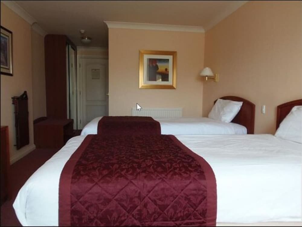 Фото Potters International Hotel