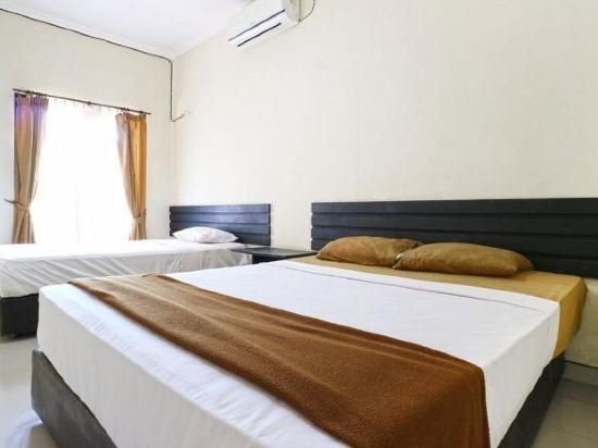 Фото Hotel Ayu Beach Inn