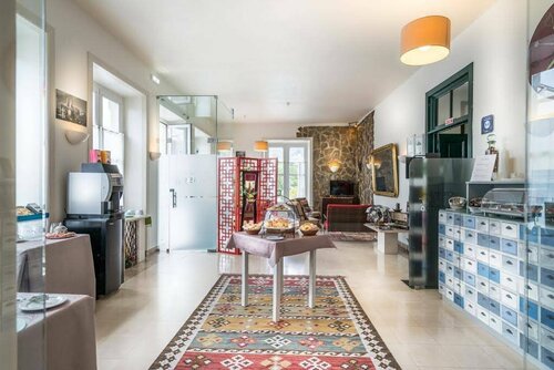 Внешний вид отеля Hotel Nova Sintra в Синтре (Санта-Марии и Сан-Мигел, Сан-Мартинью и Сан-Педру де Пенаферрим), фото 1