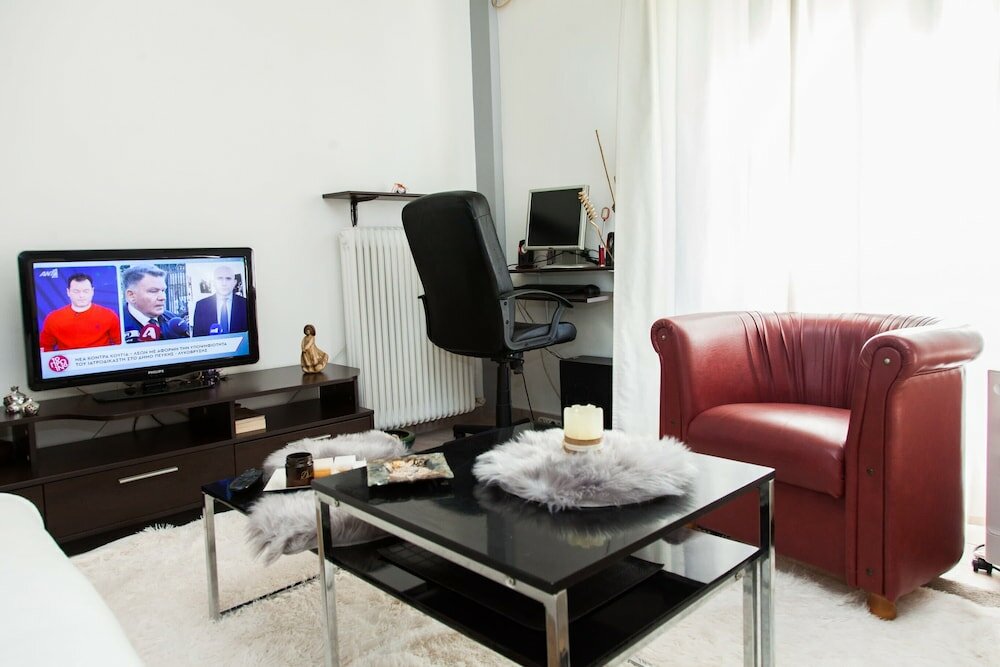 Фото Cute apartment in Neos Kosmos