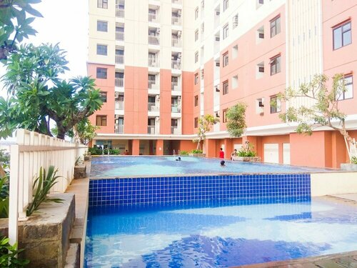 Гостиница Brand New and Compact 2br Lagoon Resort Apartment в Бекаси