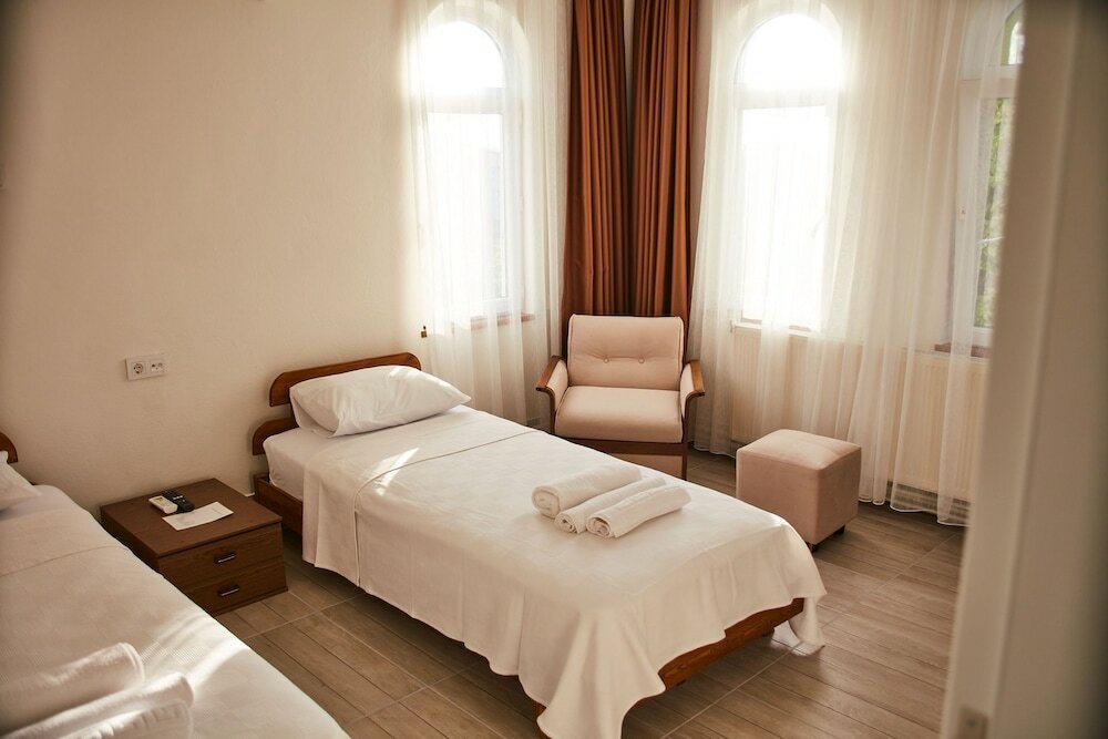 Фото Foça İlçayto Rooms