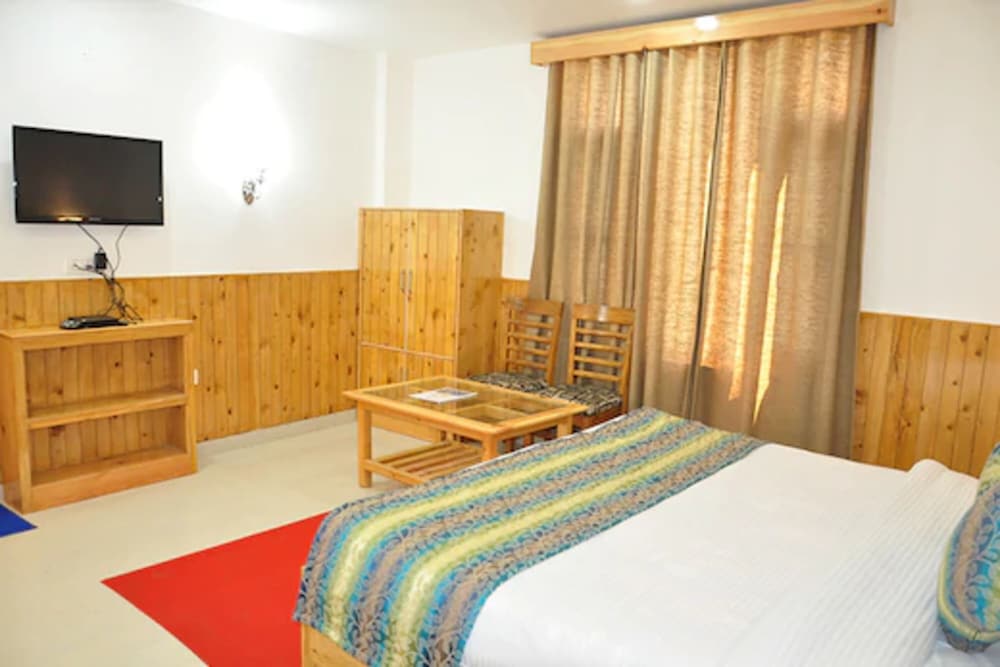 Фото Hotel Aman Palace Kasol