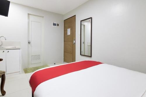 Фото Oyo 152 Sangco Condotel